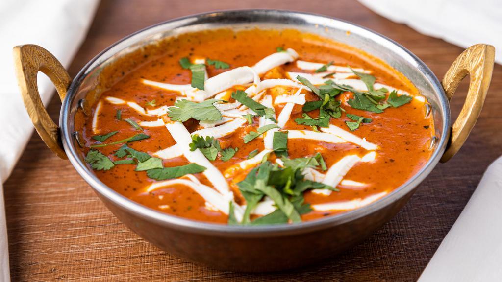 Paneer Tikka Masala · Extremely delicious in every bite cubes of paneer cheese in rich creamy tomato sauce.