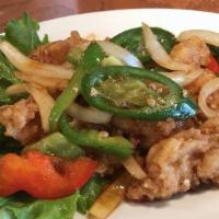 55. Pla Pad Gra-Praw · Hot and spicy. Catfish fillets sautéed with onion, bell pepper and fresh basil in special ch...