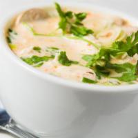 17. Tom Kha Gai · Chicken coconut milk soup with lime leaves, lemongrass, mushroom, and galangal.