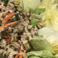 22. Larb · Hot and spicy. Choice of meat or tofu, tossed with mint leaves, chili, onions, and a touch o...