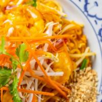 70. Pad Thai · Pan fried rice stick noodle with tofu, egg green onion and bean sprouts, topped with crushed...