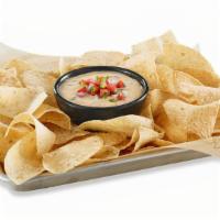 Hatch Queso · MELTED WHITE CHEDDAR / YOUNG GUNS HATCH CHILES / HOUSE-MADE PICO DE GALLO / HOUSE-MADE TORTI...