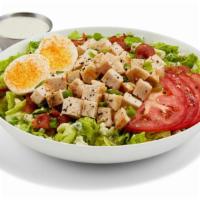 Chopped Cobb Salad · PULLED CHICKEN / ROMAINE LETTUCE / TOMATOES / BACON / HARD-BOILED EGG / RANCH DRESSING / BLE...