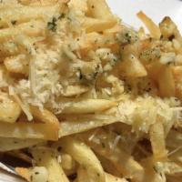 Garlic Fries · A LOT of crispy, golden french fries tossed in fresh chopped garlic and extra virgin olive o...