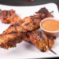 Chicken Skewers · Grilled chicken skewers served with house dipping sauce