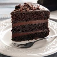 The 3 Layer Chocolate Cake · Three layers of rich and soft chocolate cake, paired with light and airy chocolate buttercre...