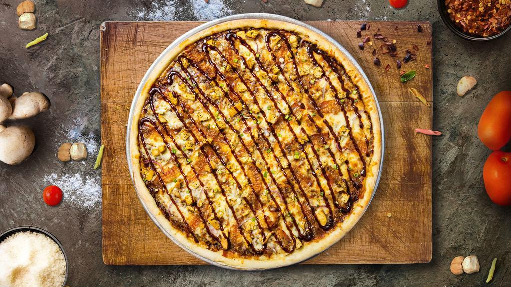 Roadhouse Texas BBQ Pizza · Hot and spicy barbeque sauce on our original crust, topped with mozzarella cheese, all-natural grilled chicken, smoked bacon, and red onions.