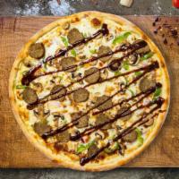 Mission: Impossible Beef BBQ Pizza · Tuscany thin crust, 100% whole milk mozzarella, sliced red onions, Impossible™️ beef, and dr...