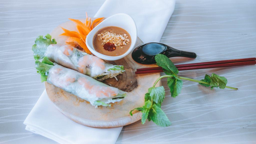 04. Gỏi Cuốn - Spring Rolls · Two rolls. Fresh shrimp, pork and green salad wrapped with rice paper, served with peanut sauce.