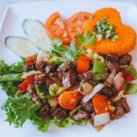 21. Cơm Bò Lúc Lắc - Shaken Beef Rice Plate · A plate of rice with choices of marinated meat, served with rice, a small bowl of soup and h...