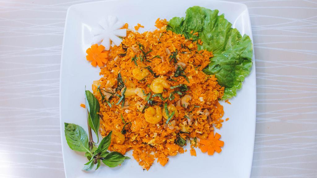 27. Cơm Chiên Thái (Spicy) · Thai style fried rice with shrimp, grilled chicken, basil leaves and pineapple.