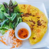 47. Bánh Xèo - Vietnamese Crepe with Salad (Dinner Only) · Shrimp, lean pork, bean, sprouts and onion covered in a crunchy Vietnamese crepe.