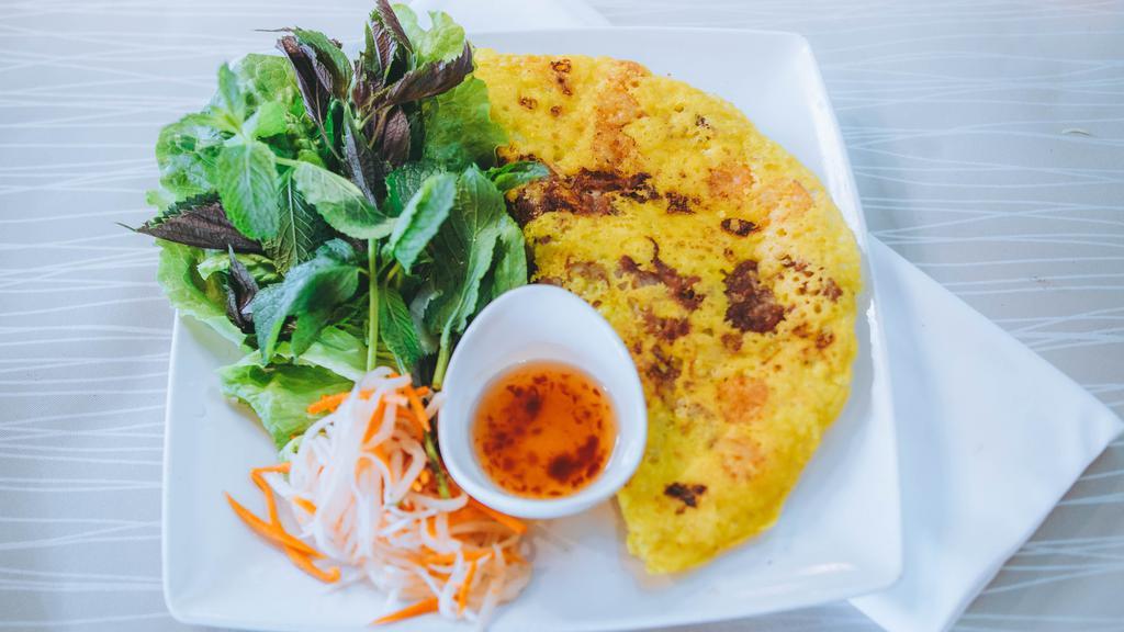 47. Bánh Xèo - Vietnamese Crepe with Salad (Dinner Only) · Shrimp, lean pork, bean, sprouts and onion covered in a crunchy Vietnamese crepe.