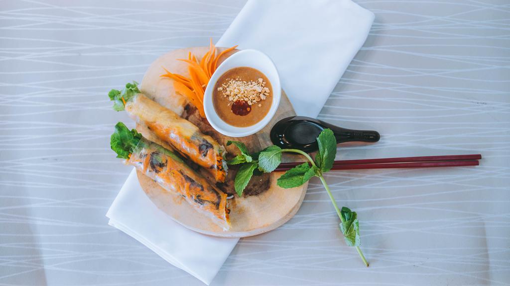 48. Gỏi Cuốn Chay - Veggie Spring Rolls · Two rolls of stir fried tofu and vegetable wrapped in rice paper served with peanut sauce.