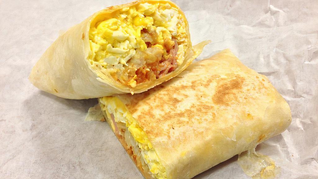 Breakfast Burrito · Scrambled eggs with ham/ bacon/sausage/turkey and hash browns, cheese and salsa.