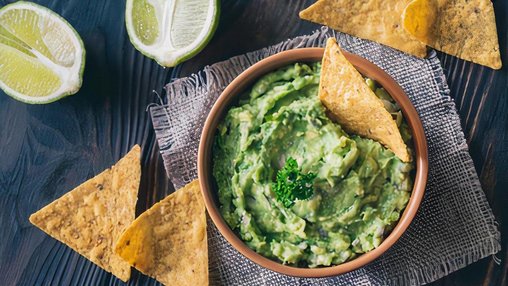 Guac 'n Chips #fromscratch · Our delicious guacamole is freshly made on a traditional molcajete for every single order.