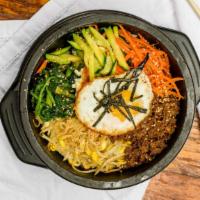 Dolsot-Bibimbap(돌솥비빔밥) · Rice Topped with Beef, Vegetables, and topped with a Fried Egg