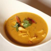 Prawn Curry · Traditional prawn cooked with fresh coconut, herbs, and spices.