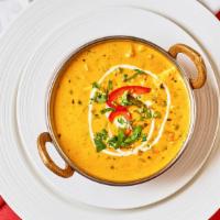 Navarattan Korma · Mixed vegetables cooked with mild creamy sauce made with cashew, onion, and tomato.