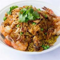 Vegetable Biryani · Vegetables with long grain basmati rice combined with aromatic herbs and spices and served w...
