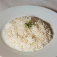 Rice · Long grain basmati rice flavored with saffron and herbs.