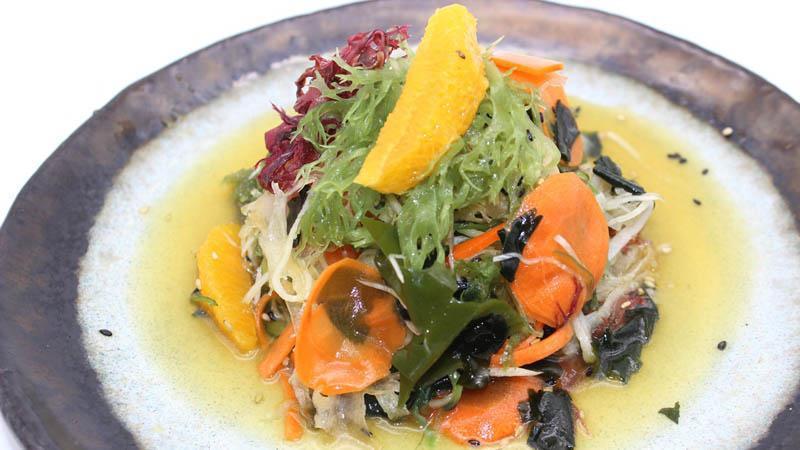 Kaiso Salad · Fresh wakame mix, seaweed salad, carrot, cucumber, daikon, tamanegi vinaigrette.