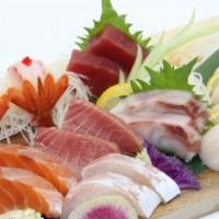 Special Sashimi (14 Pieces) · Toro two pieces, maguro two pieces, house smoked salmon two pieces, scallop two pieces, ama ...