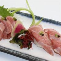 O-Toro Combo · Fatty tuna sashimi three pieces and nigiri two pieces.