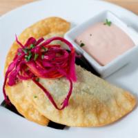 *Empanadas · savory crispy pastry filled with your choice of filling (veggie, chicken or beef) and served...