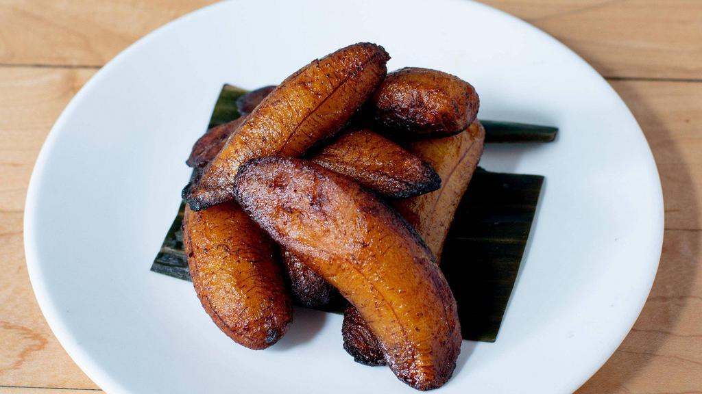 *Platanos Maduros - Sweet Plantains · sweet ripe plantains fried golden, in a Kaulua butter glaze