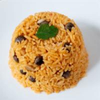 *Arroz Gandules (rice no ham) · Traditional Puerto Rican rice cooked with pigeon peas and sofrito (blend of green peppers, g...