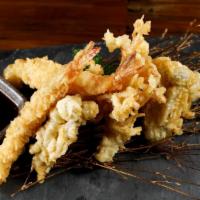 Tempura Mix · Two pieces shrimp tempura with seasonal mushroom tempura.