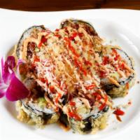 Volcano Roll · Deep fried spicy tuna and crab meat topped with crunchy (spicy mayo, eel sauce or sriracha).