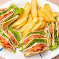 Wren's Club House Sandwich · The original triple decker. Sliced breast of  turkey, bacon, lettuce and tomato, served on  ...
