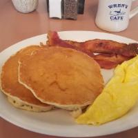 Pancake Combo · Two pancakes, two strips of bacon or sausage links and two eggs.