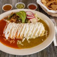 Wet Burrito · Deliciously saucy burrito with your choice of meat, rice, beans, and salsa. Topped with sour...