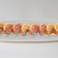 Pink Dragon · In: cooked eel, shrimp tempura, avocado out: salmon, tuna, lemon slice, unagi sauce.