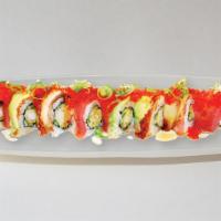 Red Dragon · In: shrimp tempura, cucumber out: cooked eel, tuna, avocado, tobiko, unagi sauce.