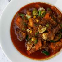 Burmese Style Mix Vegetables · Burmese curry sauce with tomatoes, okra, eggplant, yellow beans, carrots, potatoes, cabbage,...
