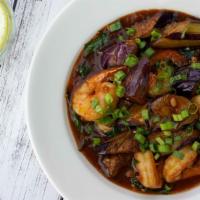 Shrimp And Eggplant · Shrimps and eggplant wok tossed in garlic, scallions with sweet chili sauce.