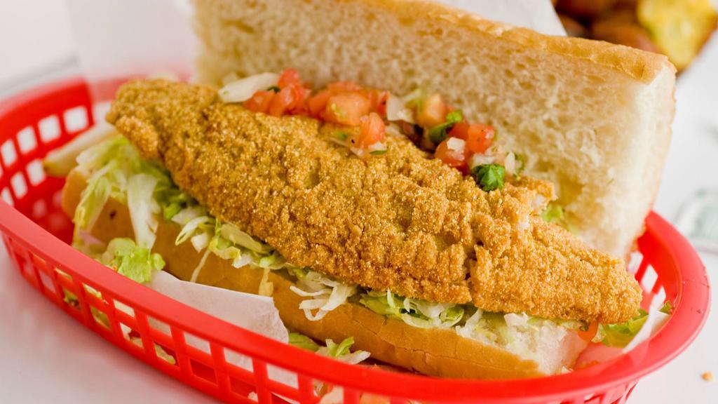 Fried Fish Po' Boy · Fresh crispy fried flaky fish, lettuce and tomato on a fresh French roll, served with your choice of mayo or tartar sauce.