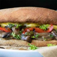 Veggie Cheesesteak · Flavor-packed mix of fresh grilled sweet onions, green peppers, mushrooms, mayo, lettuce, to...
