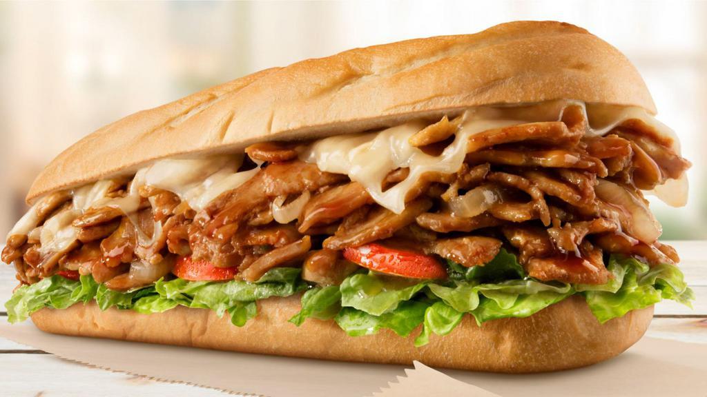 Teriyaki Cheesesteak · Thinly sliced fresh grilled steak layered with sweet grilled onions, teriyaki sauce and Provolone on a fresh French roll.
