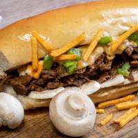 Mushroom Cheesesteak · Thinly sliced fresh grilled steak layered with sautéed mushrooms on a fresh French roll.
