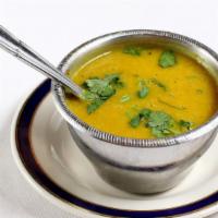 Dal Soup · Delicately spiced lentil soup garnished with vegetables.