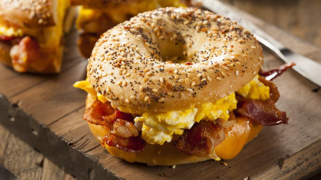 The Bacon, Egg & Cheese Bagel · Fresh eggs, bacon, and creamy cheese stuffed in between a bagel of your choice.