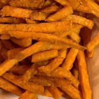 Sweet Potato Fries · Fried thin cut sweet potatoes