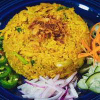 Yellow Curry Fried Rice · Fried rice with egg, onion in yellow chili powder. Served with fried shallot, jalapenos, red...