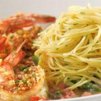Lemon-Garlic Shrimp · Sauteed Shrimp, Basil, Tomato and Lemon-Garlic Sauce. Served with Asparagus and Angel Hair P...