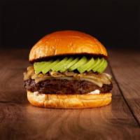 The House Burger · Beef patty, avocado, carmelized onions, and gruyere cheese on a brioche bun.
